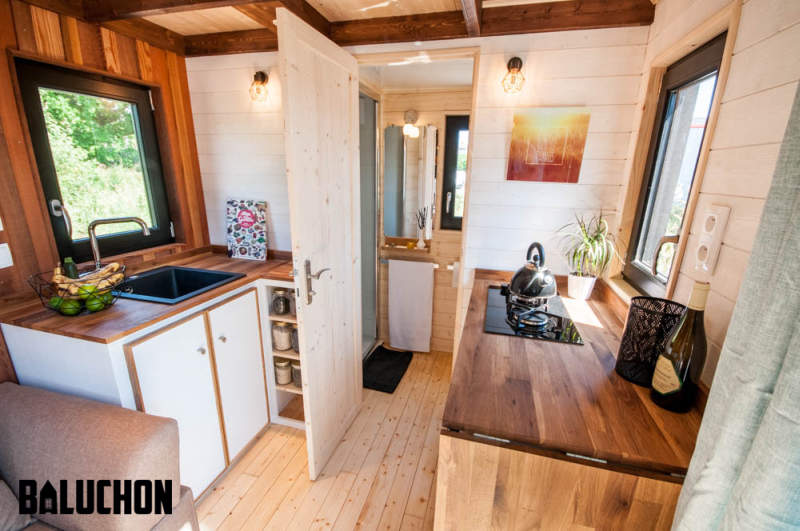 Ostara tiny house by Baluchon features two-leaf glass door