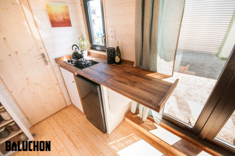 Ostara tiny house by Baluchon features two-leaf glass door