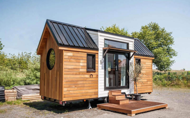Ostara tiny house by Baluchon features two-leaf glass door