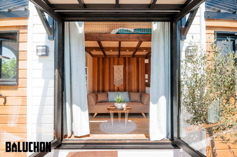 Ostara tiny house by Baluchon features two-leaf glass door