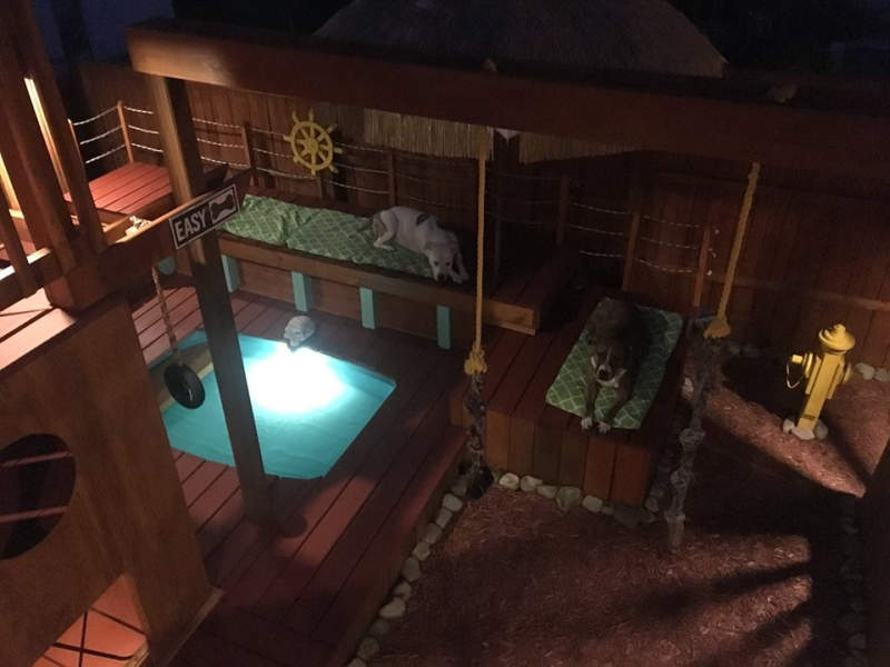 Man builds expansive dog mansion complete with pool and deck