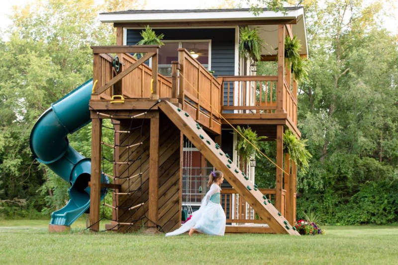 two storey wooden playhouse