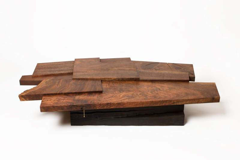 Strike/Slip table by Taylor Donsker can be split into two halves