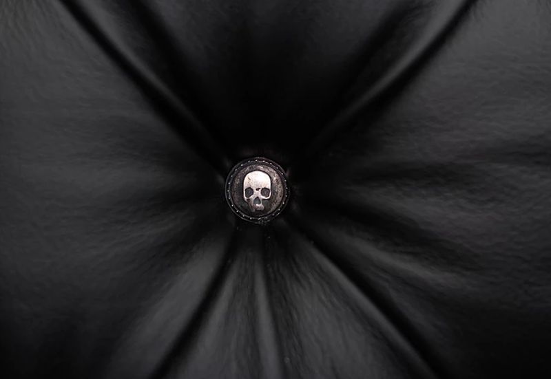 Giant skull armchair button