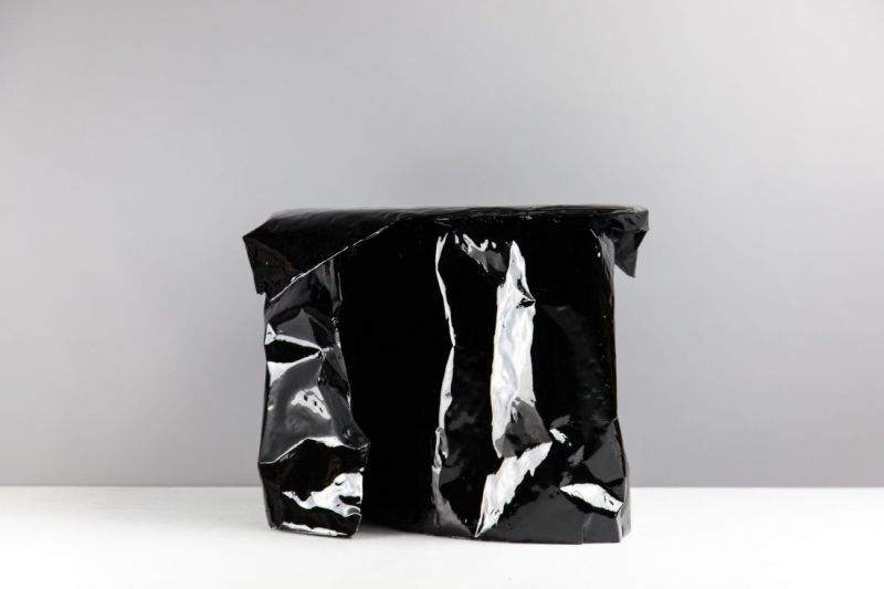 Paper plastic tables by Richard Lowry are stronger than you think
