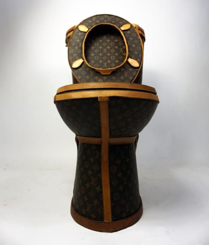 Loo-uis Vuitton golden toilet by Illma Gore is up for sale at Tradesy for $100,000