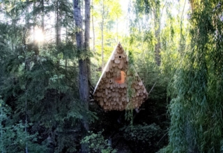 Studio North’s human-sized Birdhut features 20 birdhouses on its façade