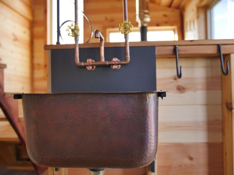 This Honey on The Rock Tiny Home is Built around the Family’s Whisky Still!