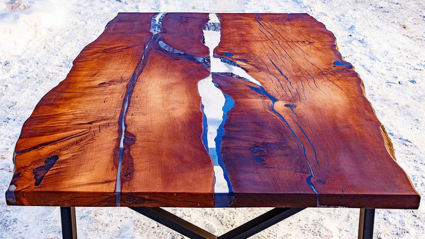 Hard Massive’s live edge dining table with epoxy resin inlay to look like river