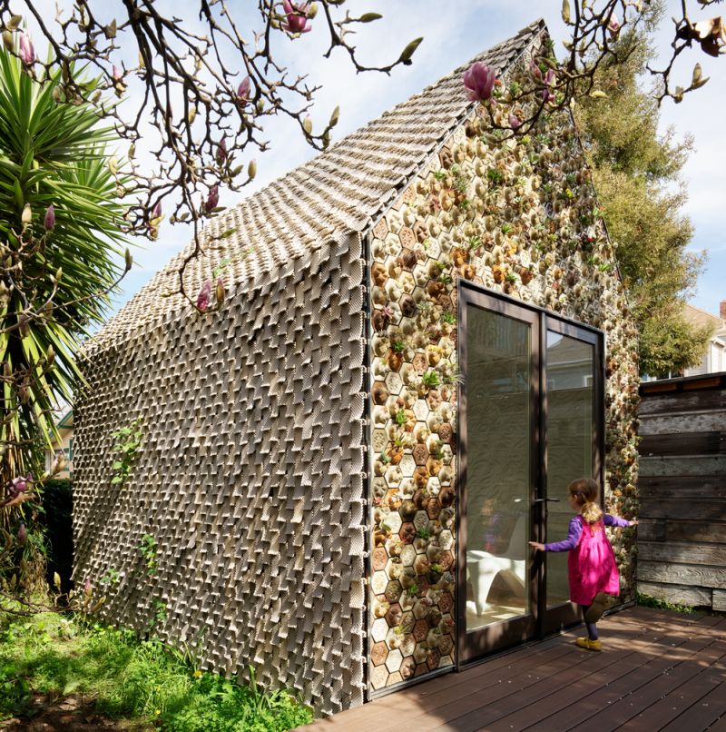 This 3D-Printed Cabin features a Living Wall of Succulents