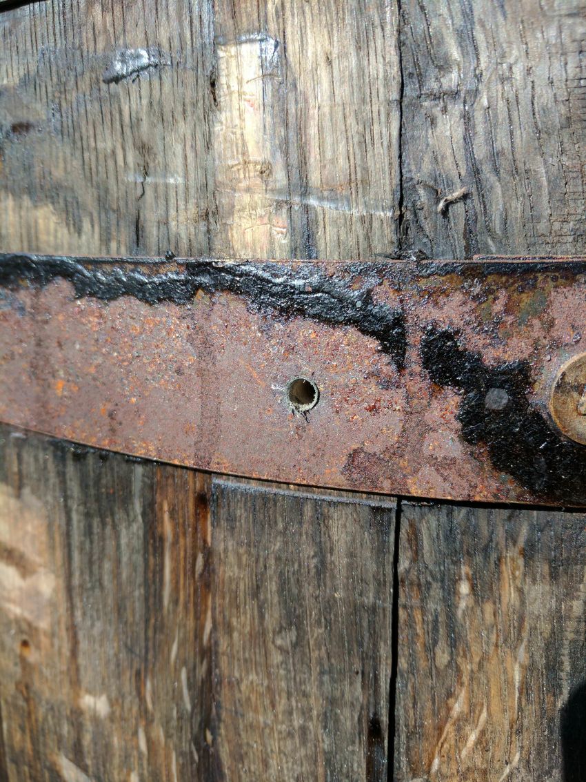 Old Whiskey Barrel with screws 