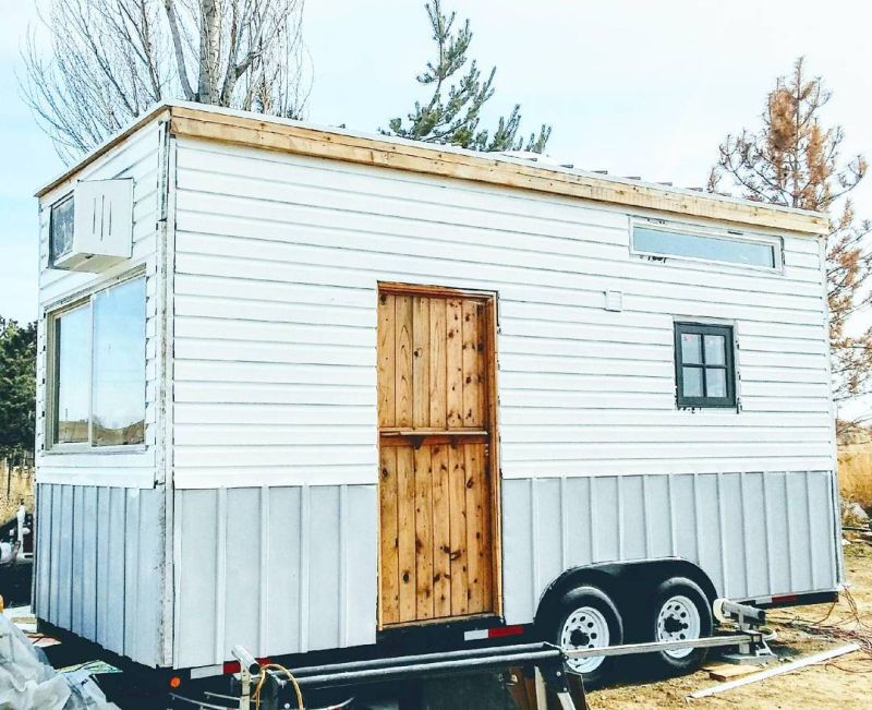 TAD Homes’ Tiny House on Wheels with Garage Door 