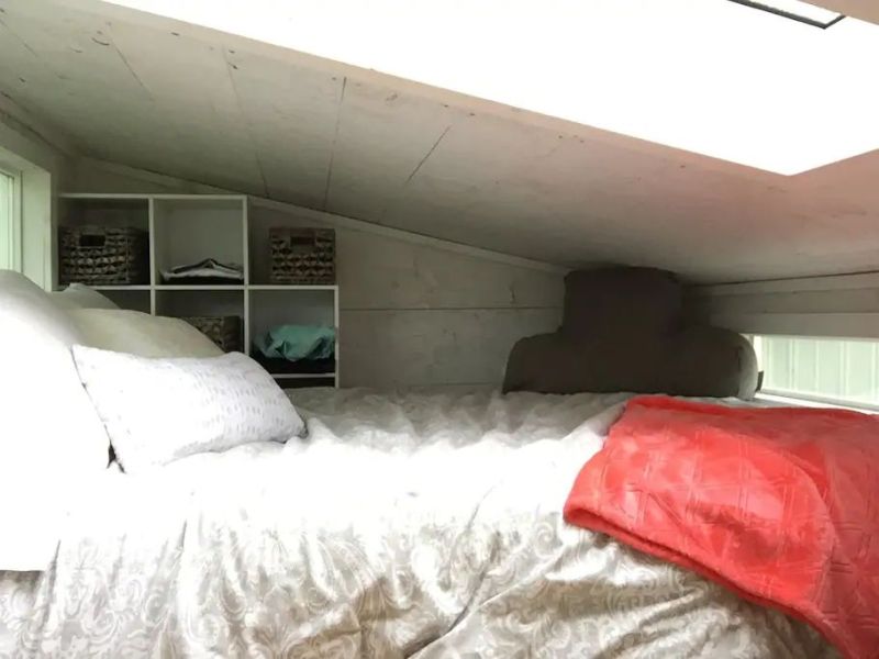 TAD Homes’ Tiny House on Wheels with Garage Door 