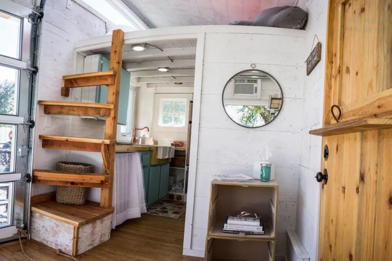 TAD Homes’ Tiny House on Wheels with Garage Door 
