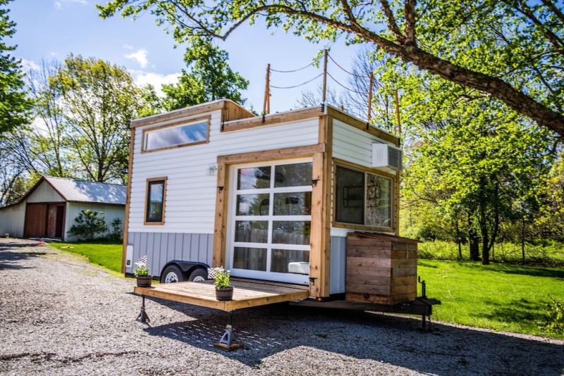TAD Homes’ Tiny House on Wheels with Garage Door 