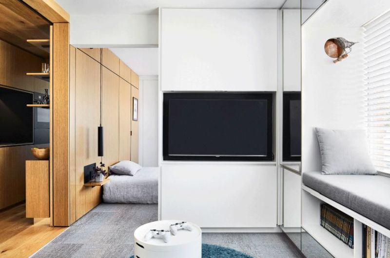 tsai design apartment hides bedroom behind sliding walls-Apartment living- Living Room area