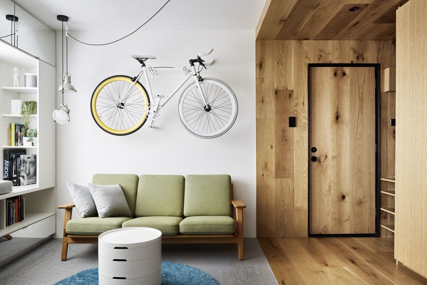 tsai design apartment hides bedroom behind sliding walls