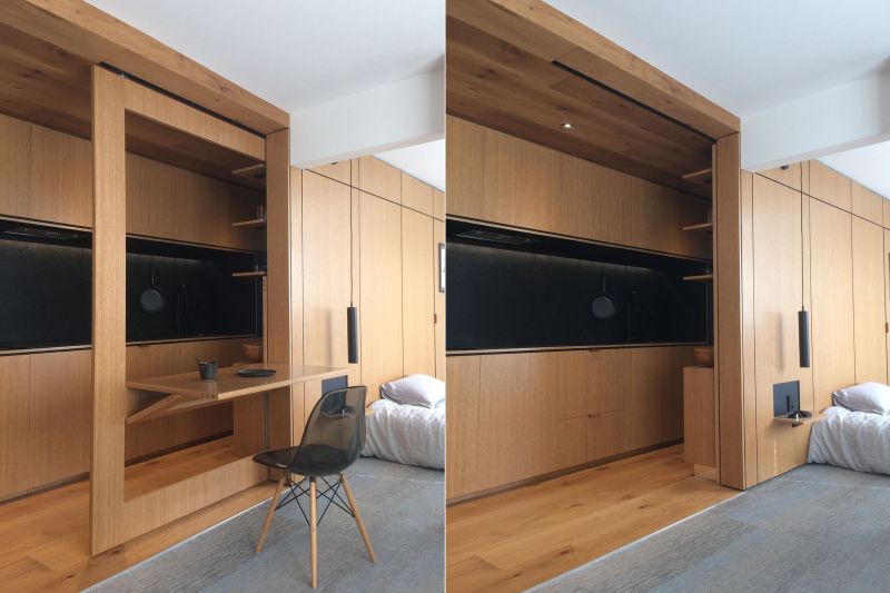 tsai design apartment hides bedroom behind sliding walls