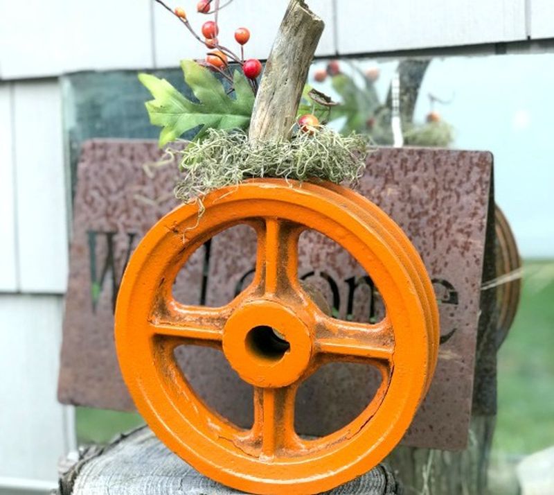 Decorate Your Yard with DIY Metal Wheel Halloween Pumpkin