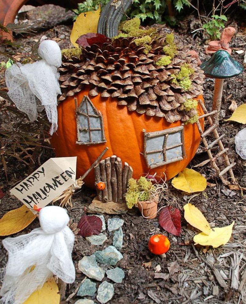 fairy house in your garden using pumpkin and other handmade decorations