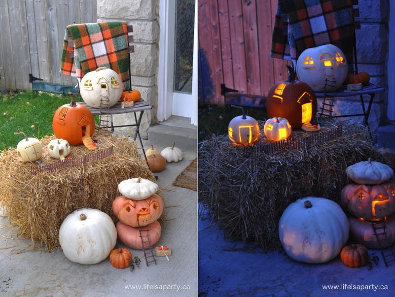 pumpkins fairy houses with glowing light through windows 