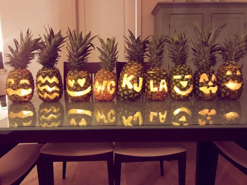 Pineapple jack-o'-lantern with letters carving 