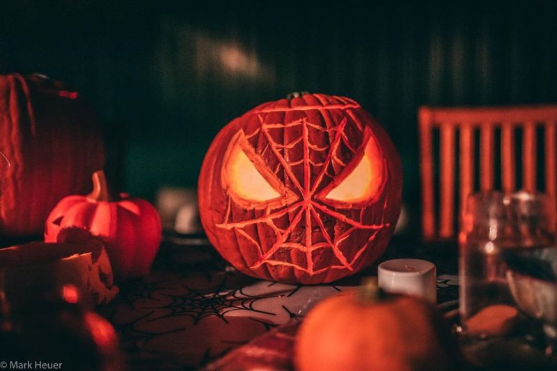 Spider man carved pumpkin