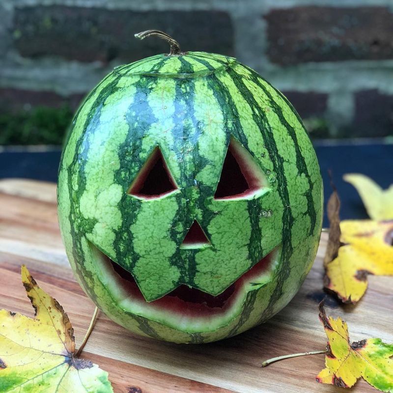 Watermelon jack-o'-lantern carving for halloween 