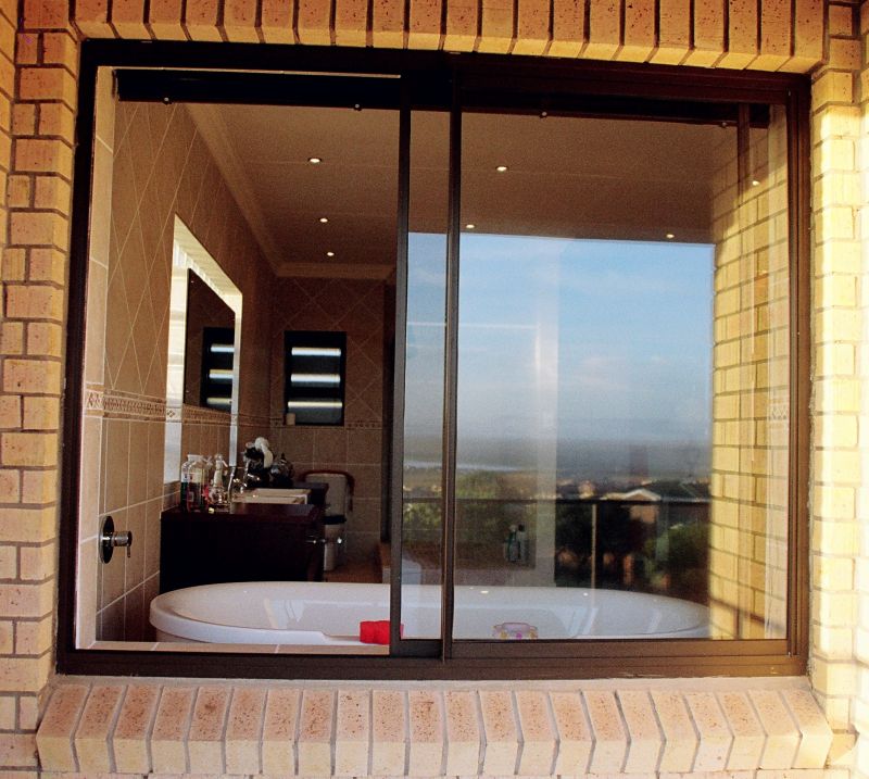 Modern Slider window in bathroom 