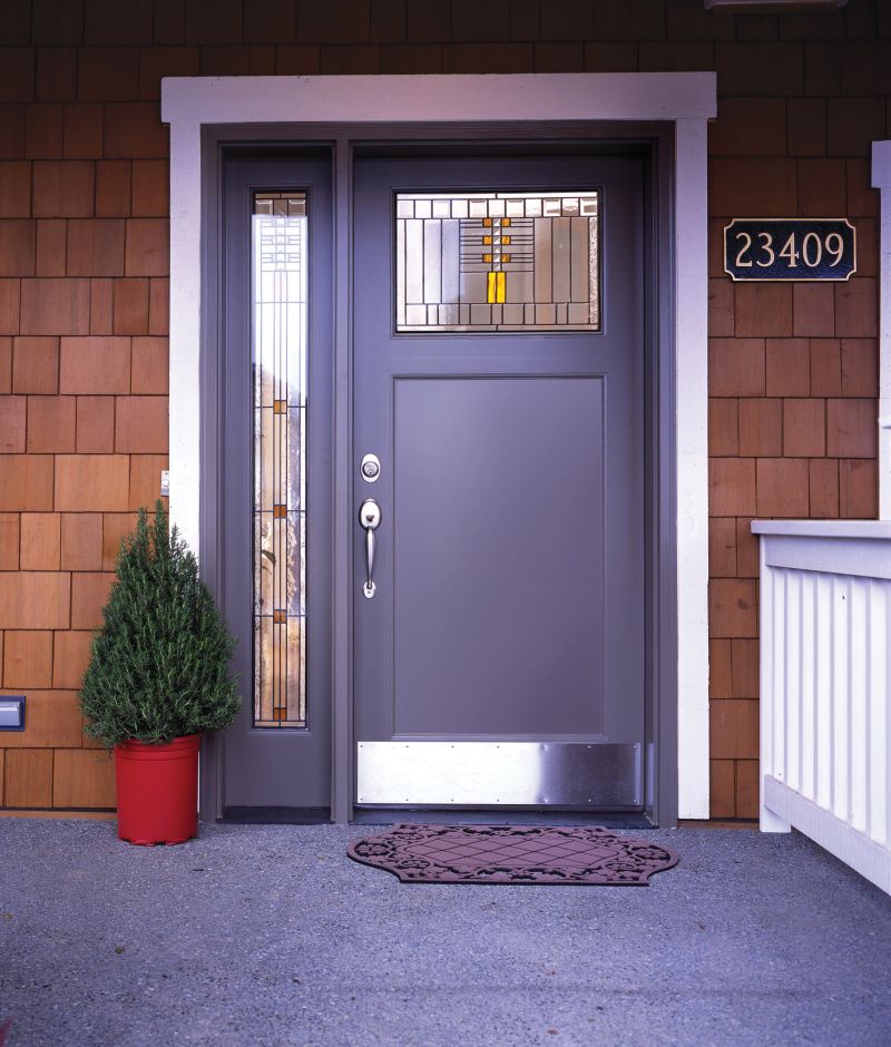 Transom windows in front door of home  