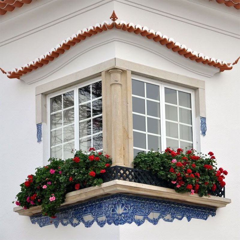 corner windows design from outside with planter box 