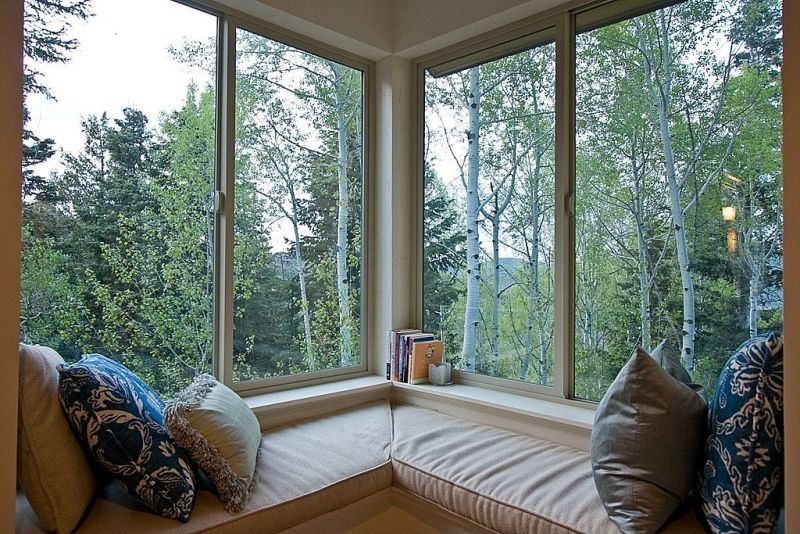 Modern corner windows with seating