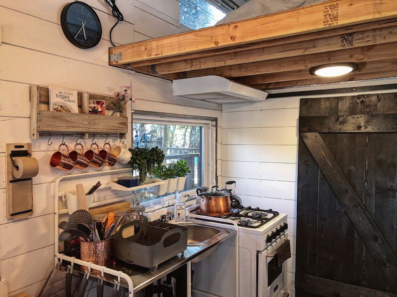 Young Couple builds Tiny house to Afford College 