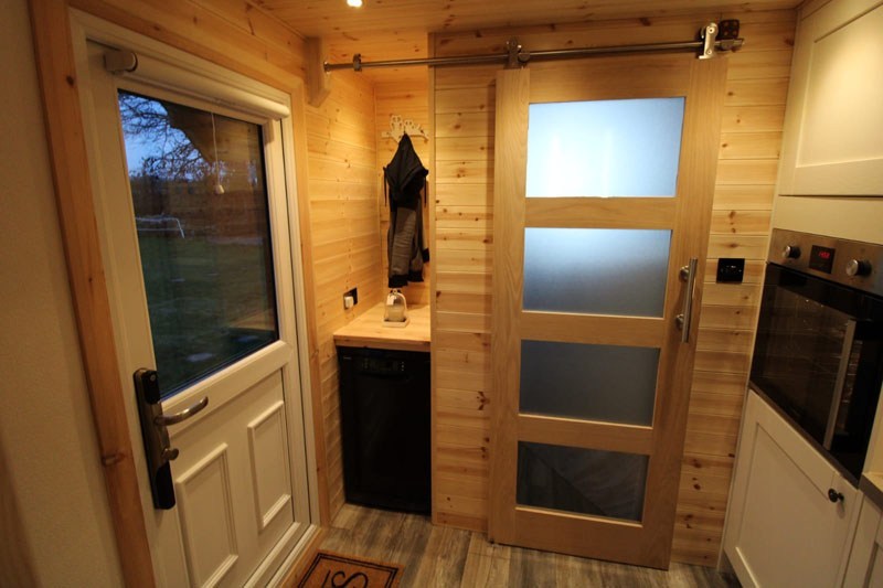 Chris Marsh Saves On Monthly Bills by Shifting to Self-Built Tiny House on Wheels 