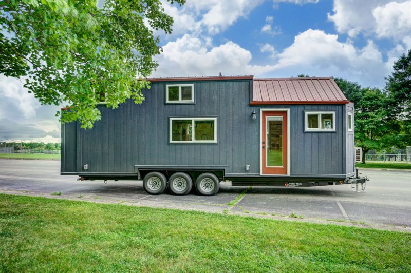 Modern Tiny Living’s Serenity Tiny House Features Office at Back Door