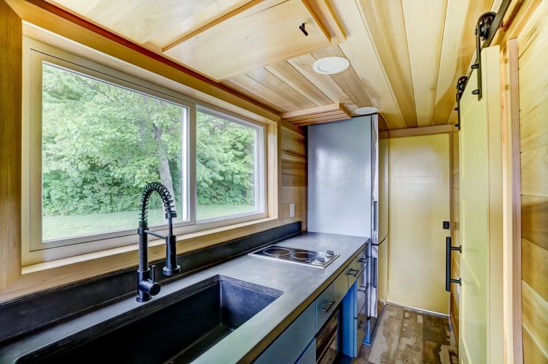 Modern Tiny Living’s Serenity Tiny House Features Office at Back Door