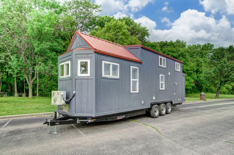 Modern Tiny Living’s Serenity Tiny House Features Office at Back Door