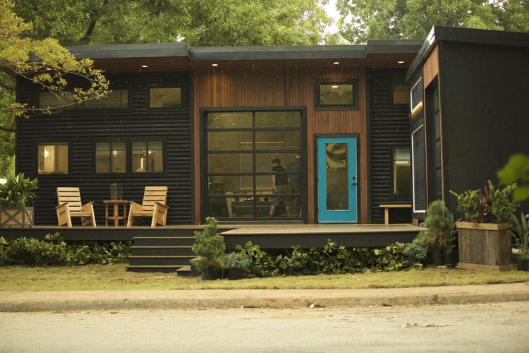 The Rocker is a double tiny house in Arkansas, features a house on foundation and a separate tiny house on wheels