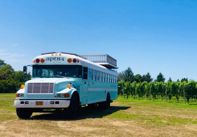 Apt84 is School bus Transformed into Tiny house on Wheels hosts Tours, Events and Weddings