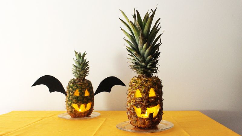 This Halloween Light Pineapple Jack-o-lanterns instead of Pumpkins