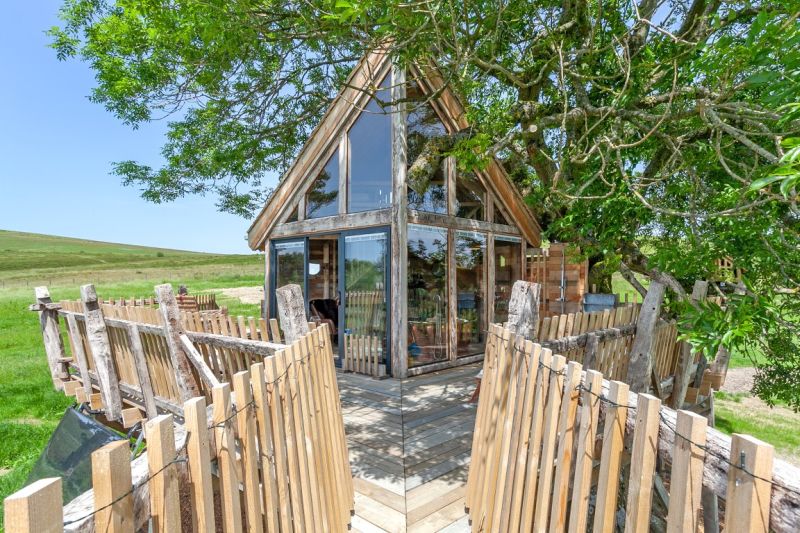 Cadwollen’s Treehouse is one of the vacation rentals available at the Squirrel's Nest Treehouse retreat located on a working family farm in Powys, Mid Wales, UK. 