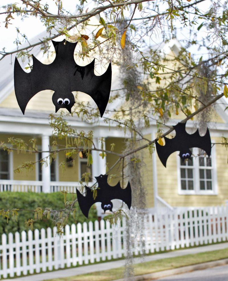 Hanging foam bats hanging from garden tree