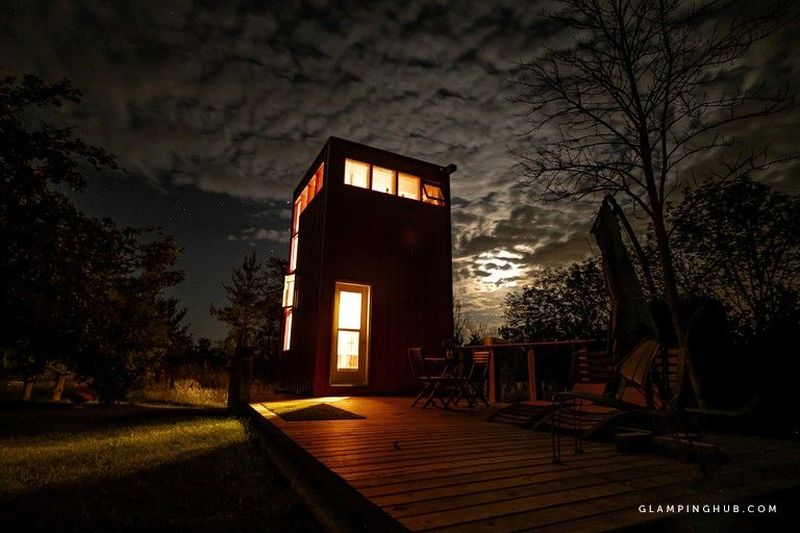 This Tiny House Rental in Ontario Looks Like a Vertically Placed Shipping Container 