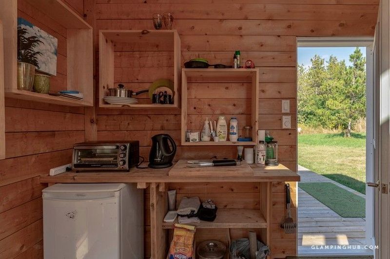 This Tiny House Rental in Ontario Looks Like a Vertically Placed Shipping Container 