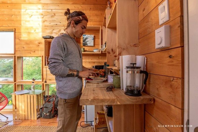 This Tiny House Rental in Ontario Looks Like a Vertically Placed Shipping Container 