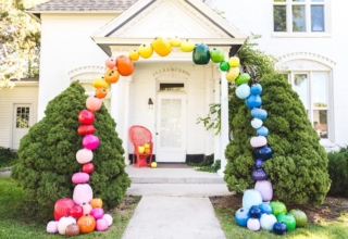 DIY Rainbow Pumpkin Arch to Jazz Up Entry of Your House for Halloween