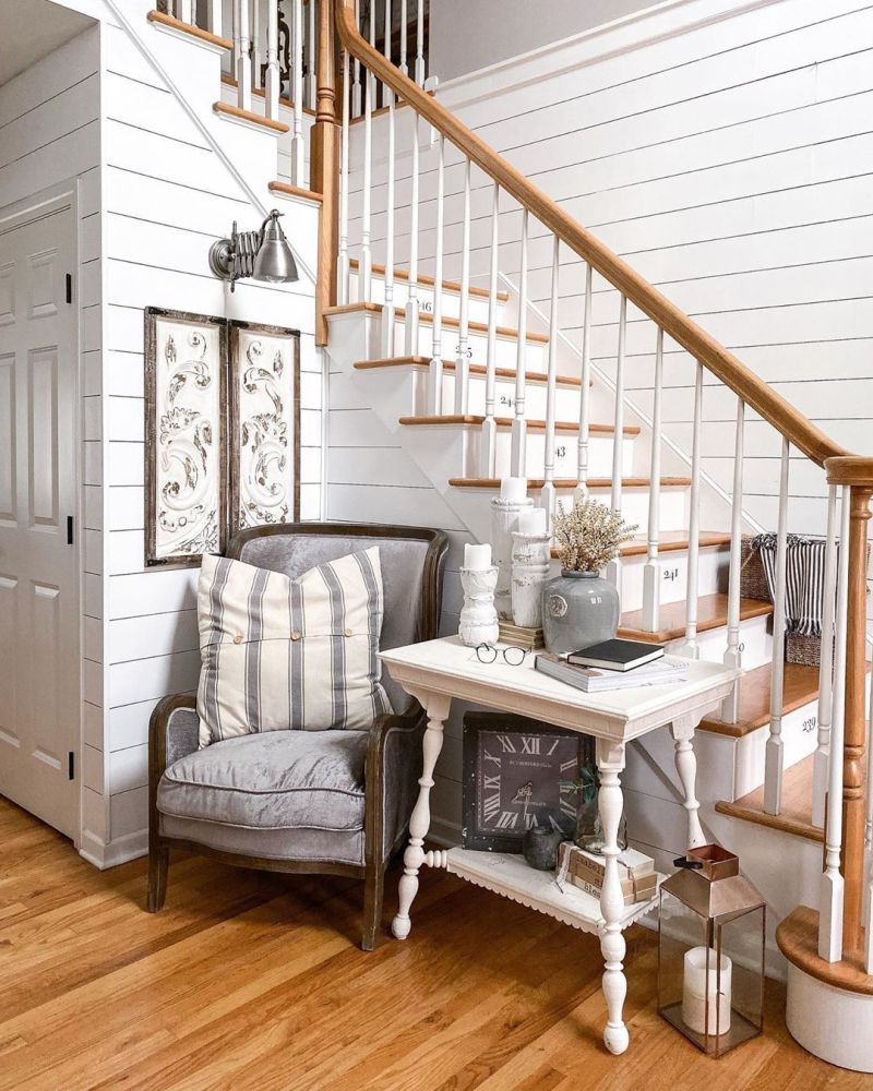 chair and table under stairs 