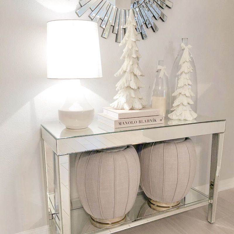 white Christmas tree in entryway