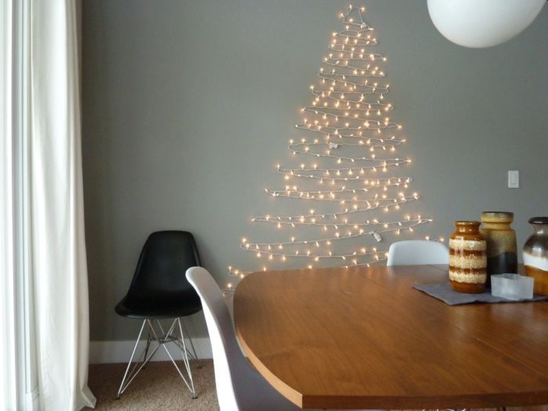 lights on wall in shape of Christmas tree