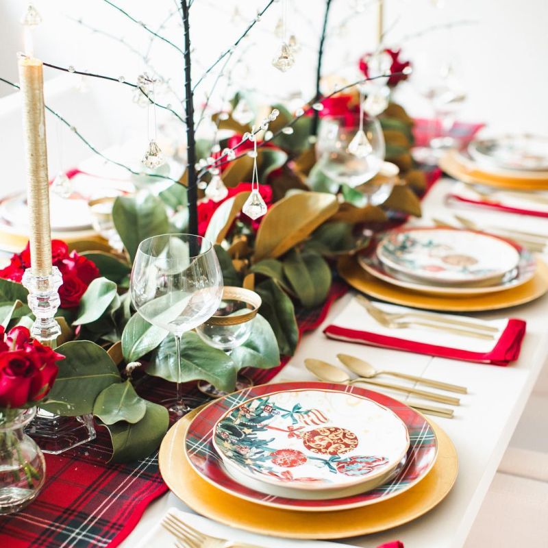 colorful Christmas tablescape with a magnolia garland 